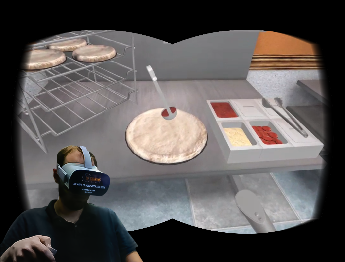 Designing Digitally - A person wearing a VR headset engages with a fast food training simulation, skillfully interacting with a virtual pizza-making experience, complete with a pizza base and various ingredients on the counter. Designing Digitally -