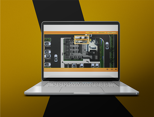 Laptop displaying fast food training simulations on screen with a yellow and black color scheme in the background.