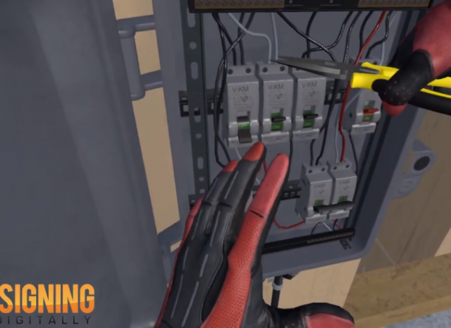 Designing Digitally - A person wearing gloves using a multimeter to test electrical circuits inside an open industrial control panel in a Virtual Reality simulation. Designing Digitally -