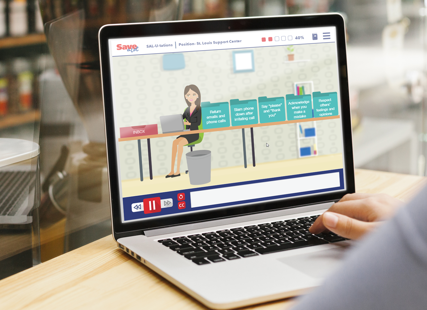 Designing Digitally - A person participates in a virtual business meeting displayed on a laptop screen, with interactive icons like mute, chat, and share screen visible, provided by an eLearning Vendor. Designing Digitally -