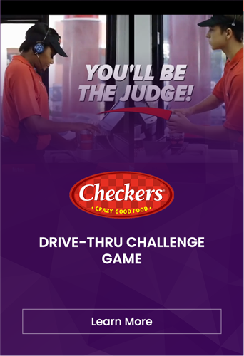 Employee at a Checkers fast-food drive-thru window interacting with a customer during the Drive-Thru Challenge Game.