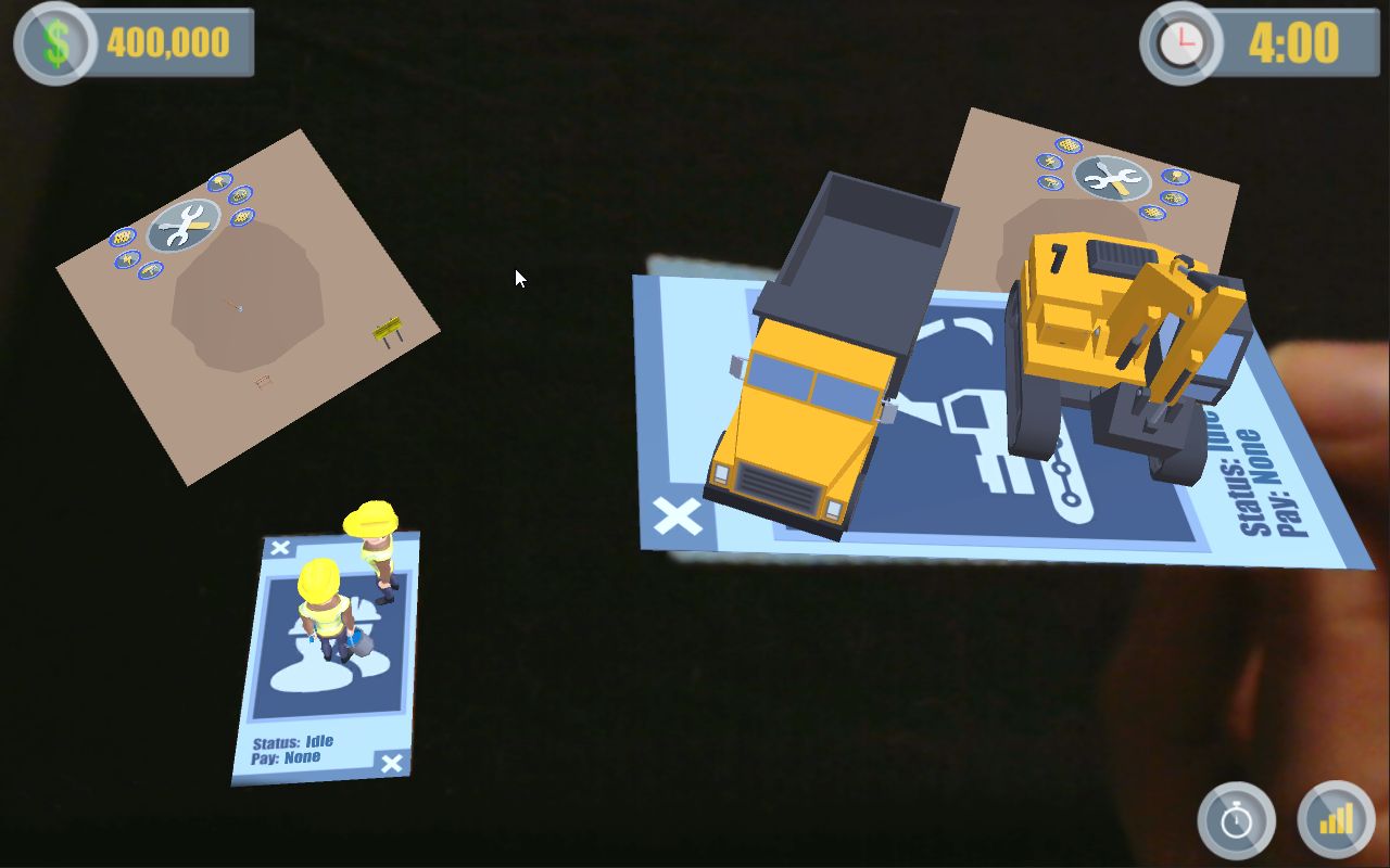 An augmented reality training game interface with construction vehicles and a worker displayed on a mobile device screen.