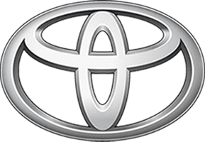 Designing Digitally - Silver Toyota logo with a stylized oval-shaped design, prominently featuring interlocking circles on a plain background, used by an Online Training Vendor. Designing Digitally -