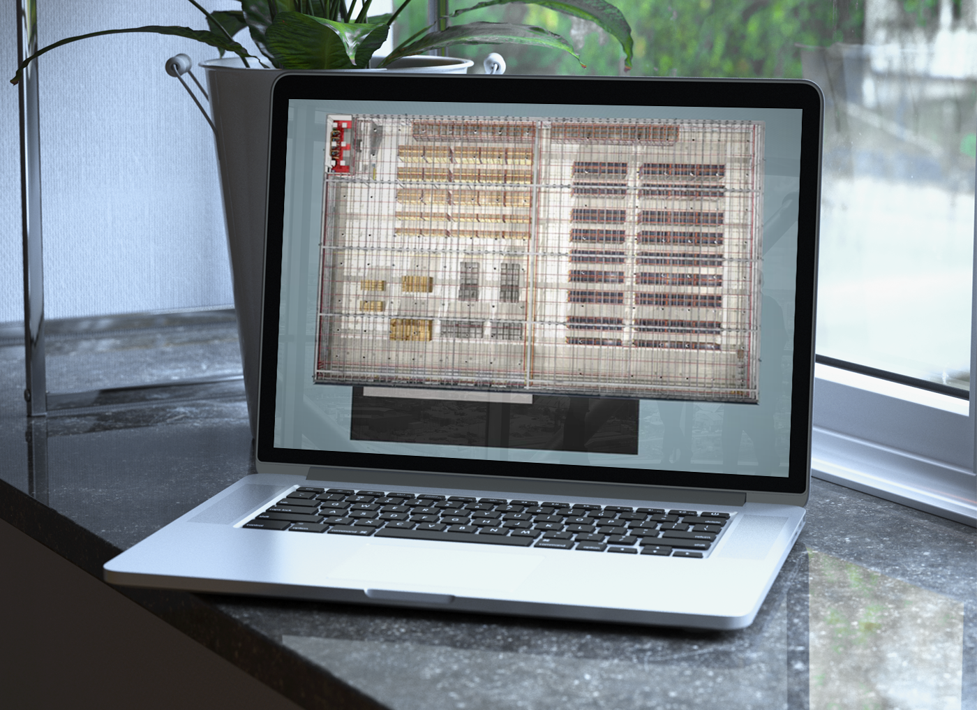 Designing Digitally - A laptop on a kitchen counter displaying a complex spreadsheet with numerous rows and columns supplied by an Online Training Vendor. Designing Digitally -