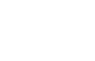 A man is riding a bike on a hill, enjoying the exhilaration of the steep incline.