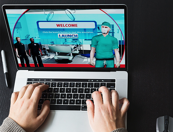 Designing Digitally - An Emergency Room Nurse is using a laptop with a medical simulation program displayed on the screen, featuring an option to launch a virtual surgery environment for training simulations. Designing Digitally -