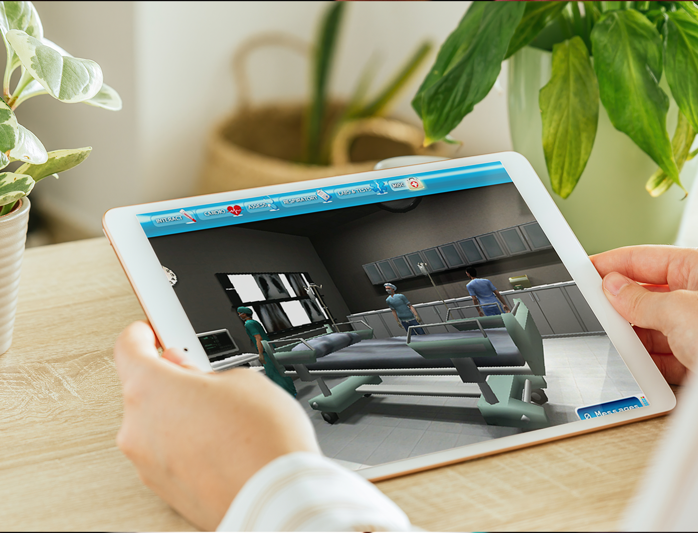 Designing Digitally - A person is holding a tablet displaying a training simulation with virtual characters in a hospital setting, preparing an emergency room nurse. Plants are visible in the background. Designing Digitally -