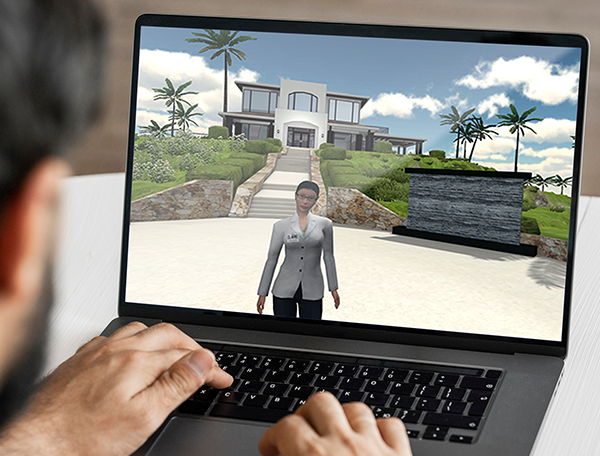 A man engaging in Occupational Therapy Simulations, using a laptop to interact with a virtual reality image of a house.