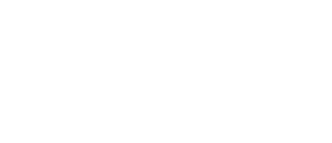 Designing Digitally - A white slanted capital "M" flanked by two forward slashes on a transparent background, resembling the precision of Steel Manufacturing Training Simulations. Designing Digitally -